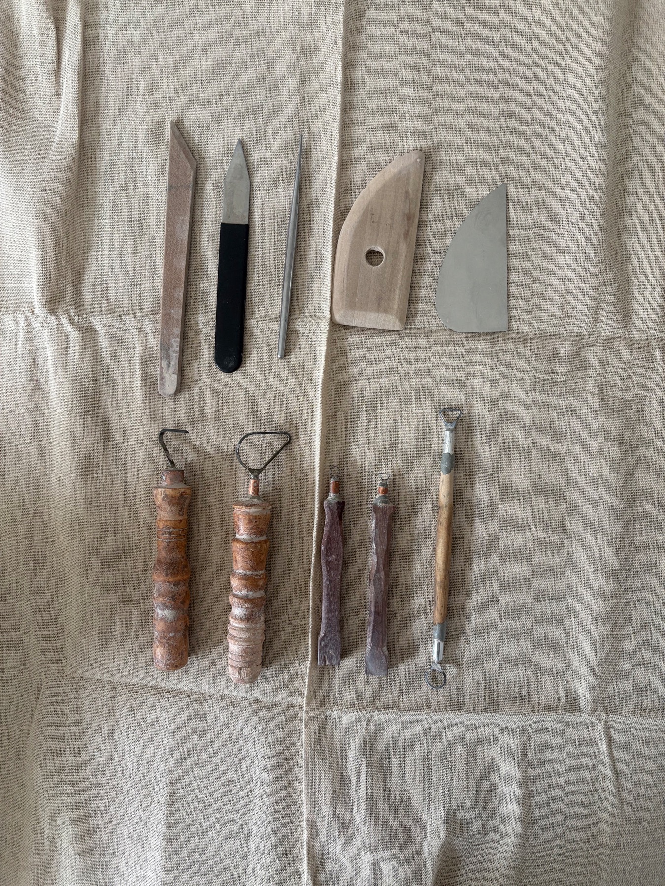 Pottery tools laid out in the studio