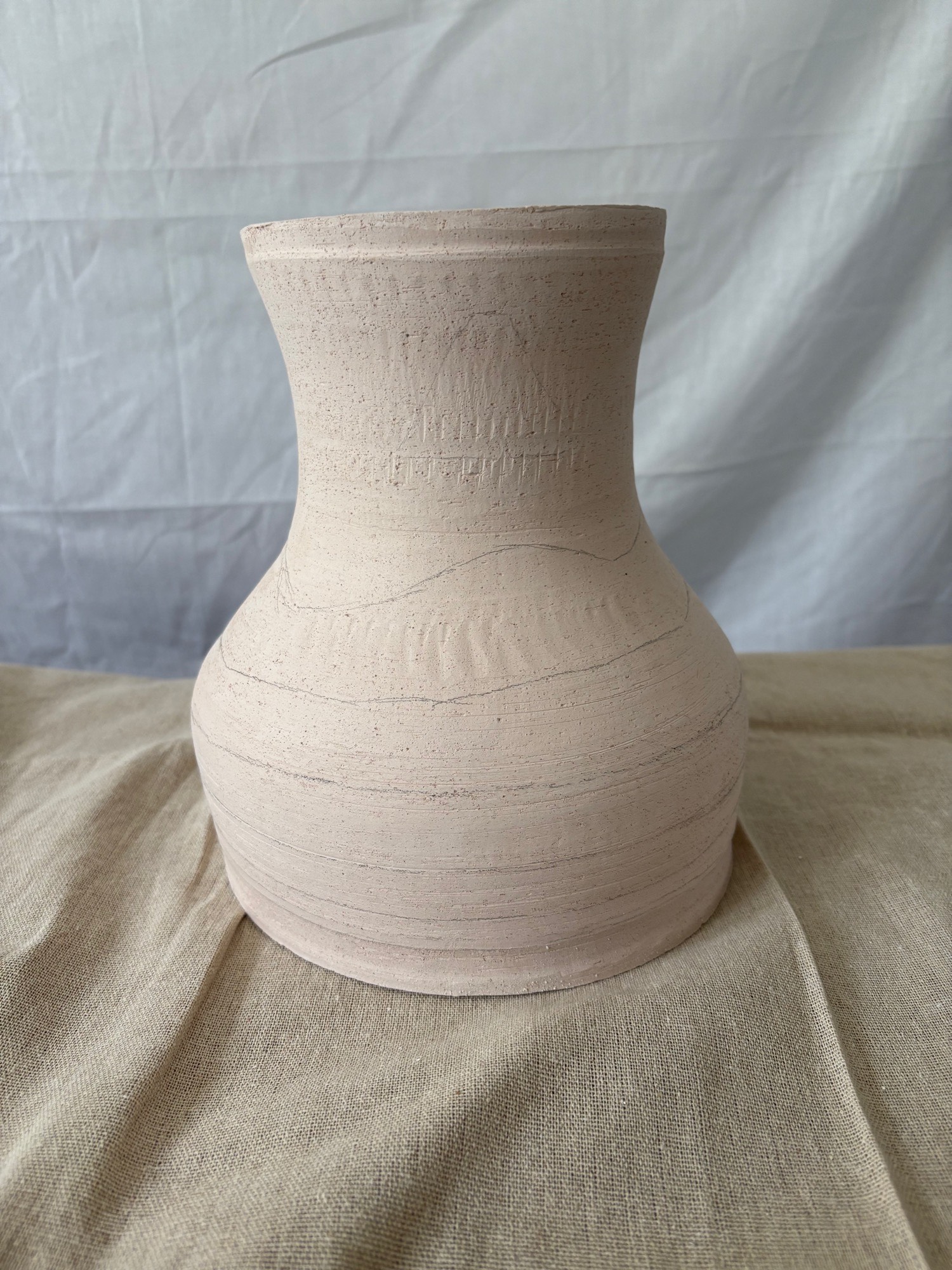 Bisque-fired ceramic darbuka forms