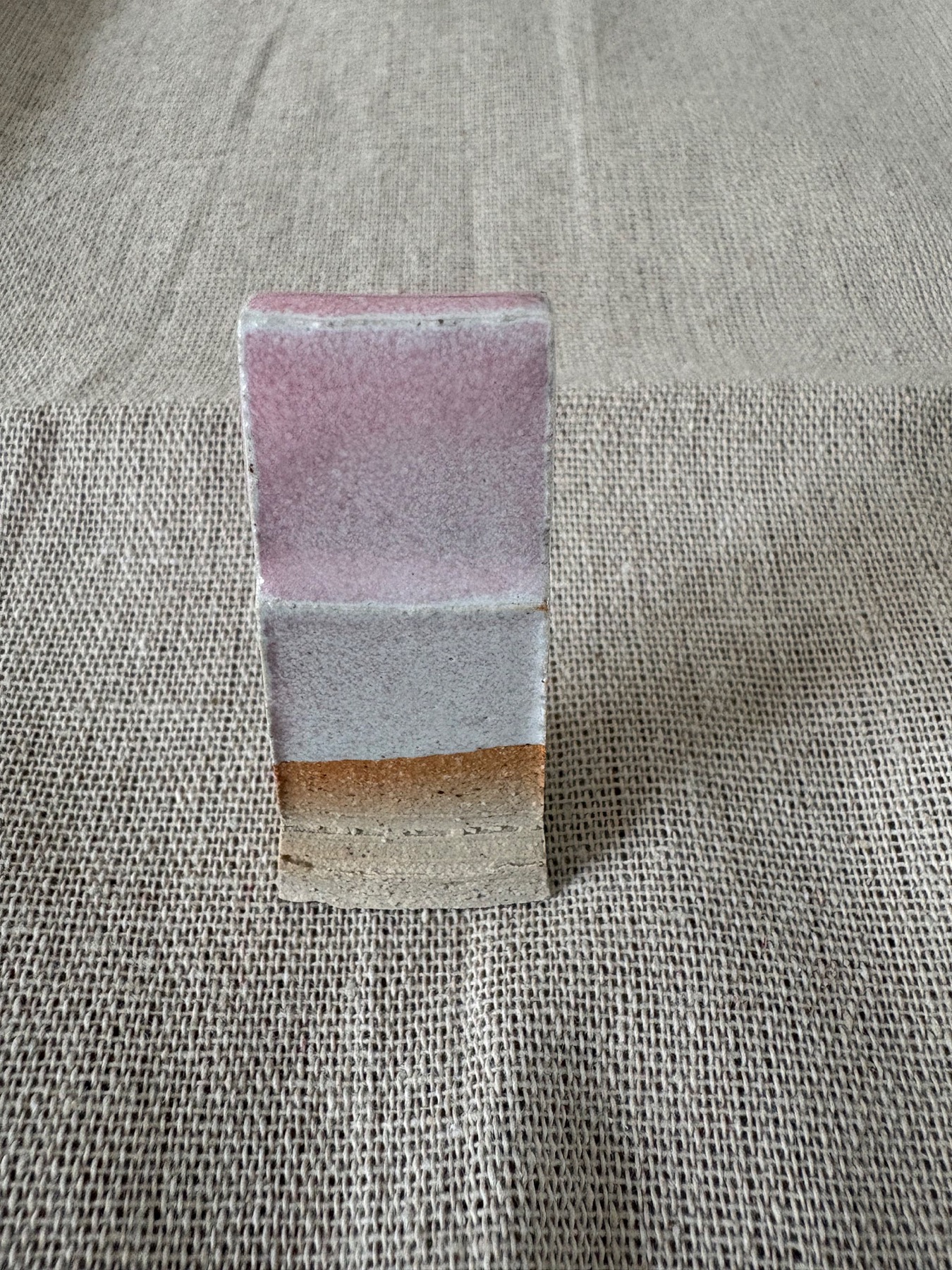 No chrome pink glaze trial tile showing the base blushing effect